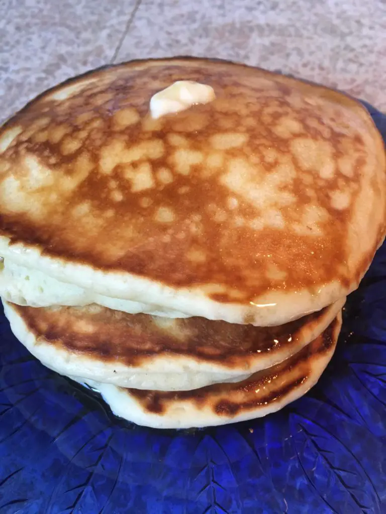 butter melting on pancake stack