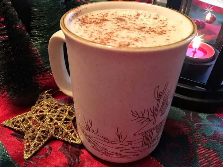 a mug of warm spiked eggnog