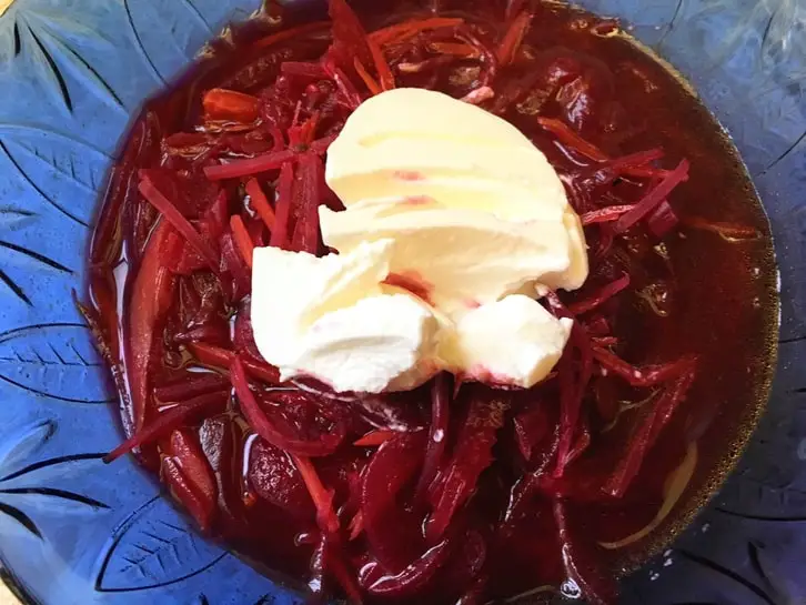 bowl of borscht with sour cream 