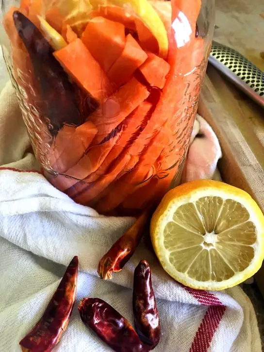 making lacto-fermented chilli lemon carrot sticks