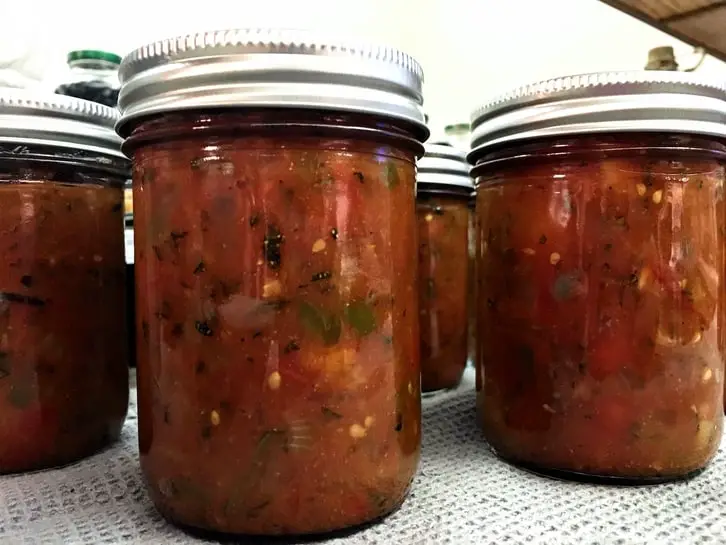 preserving jars of zucchini salsa