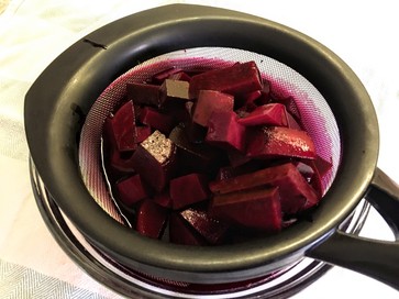beets in a strainer