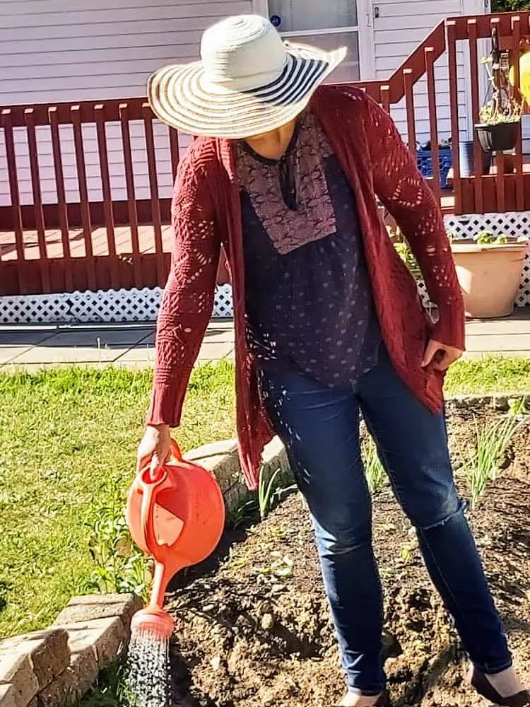 mother gardening alone